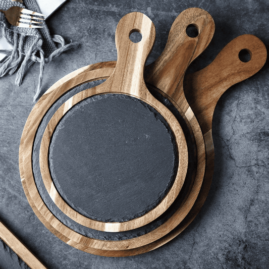 Rustik wooden serving board with slate surface and handle for cheese, tapas and charcuterie.