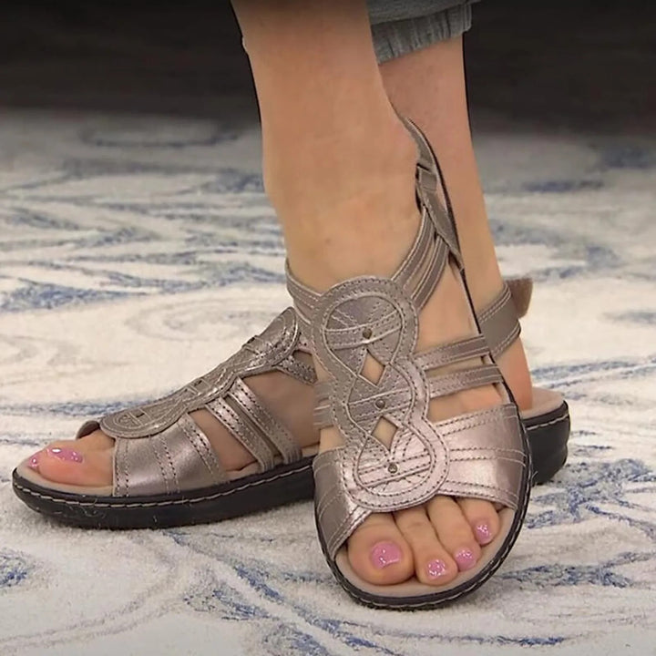 "Svarta dam sandaler med ergonomisk fotvalvstöd, lätta material, stilren design, mångsidiga för alla tillfällen."