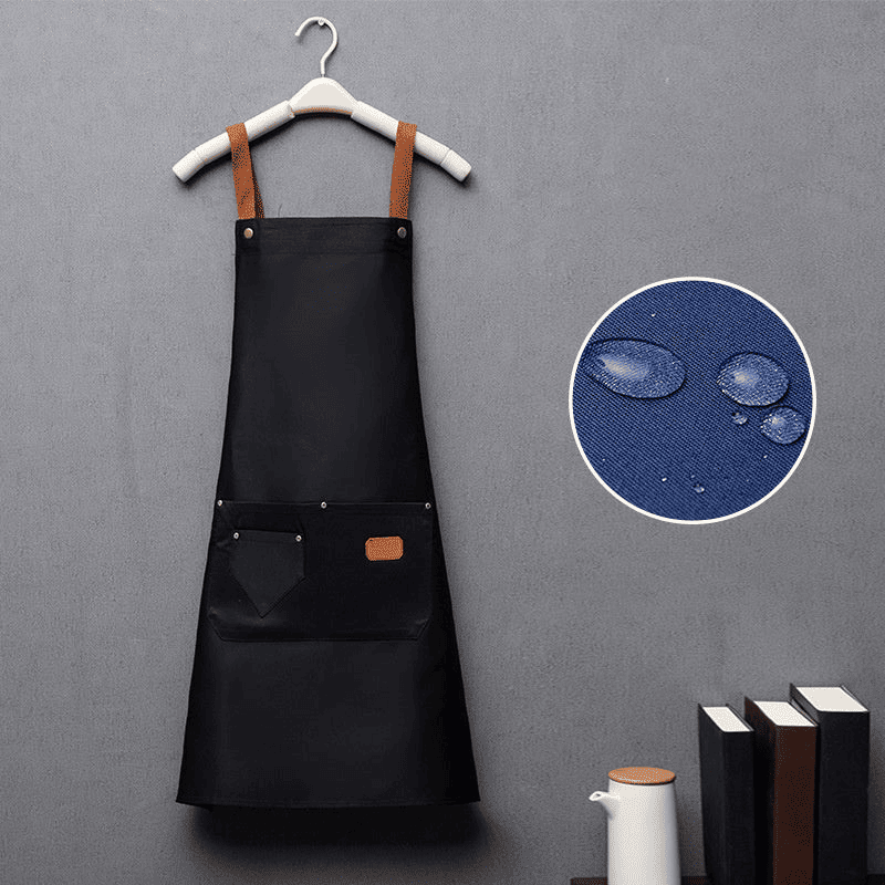 Unisex kitchen apron with adjustable straps and pockets, made from Oeko-Tex certified cotton